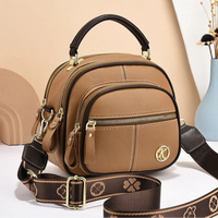 Megan | Sac bandoulière compact à compartiments multiples