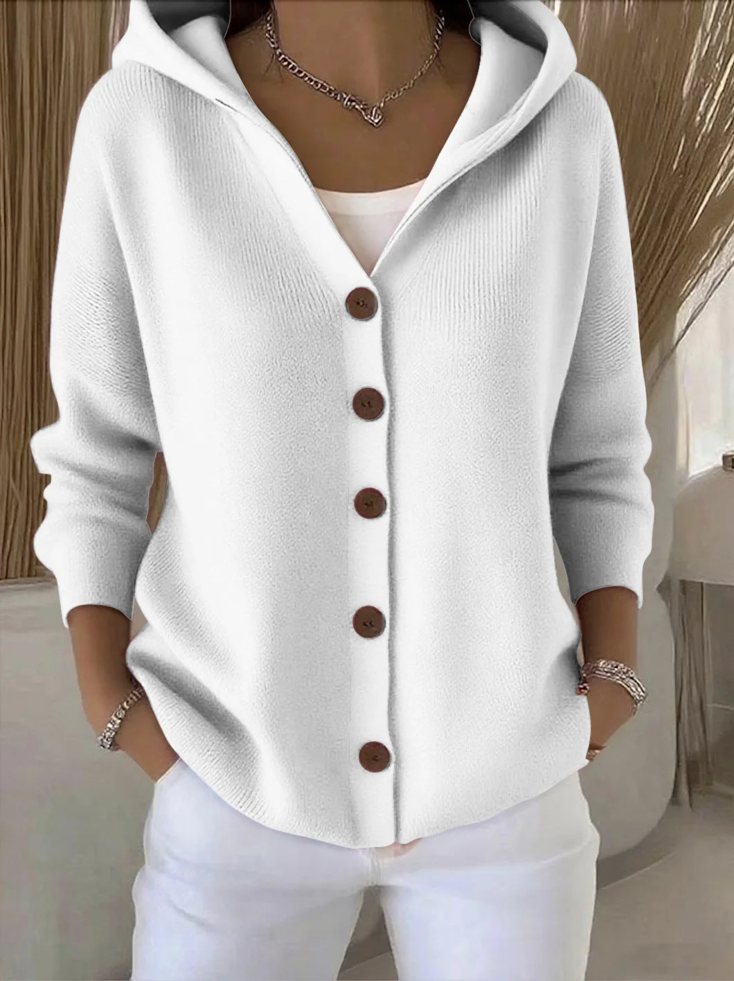 Darienne | Cardigan long boutonné en tricot avec capuchon